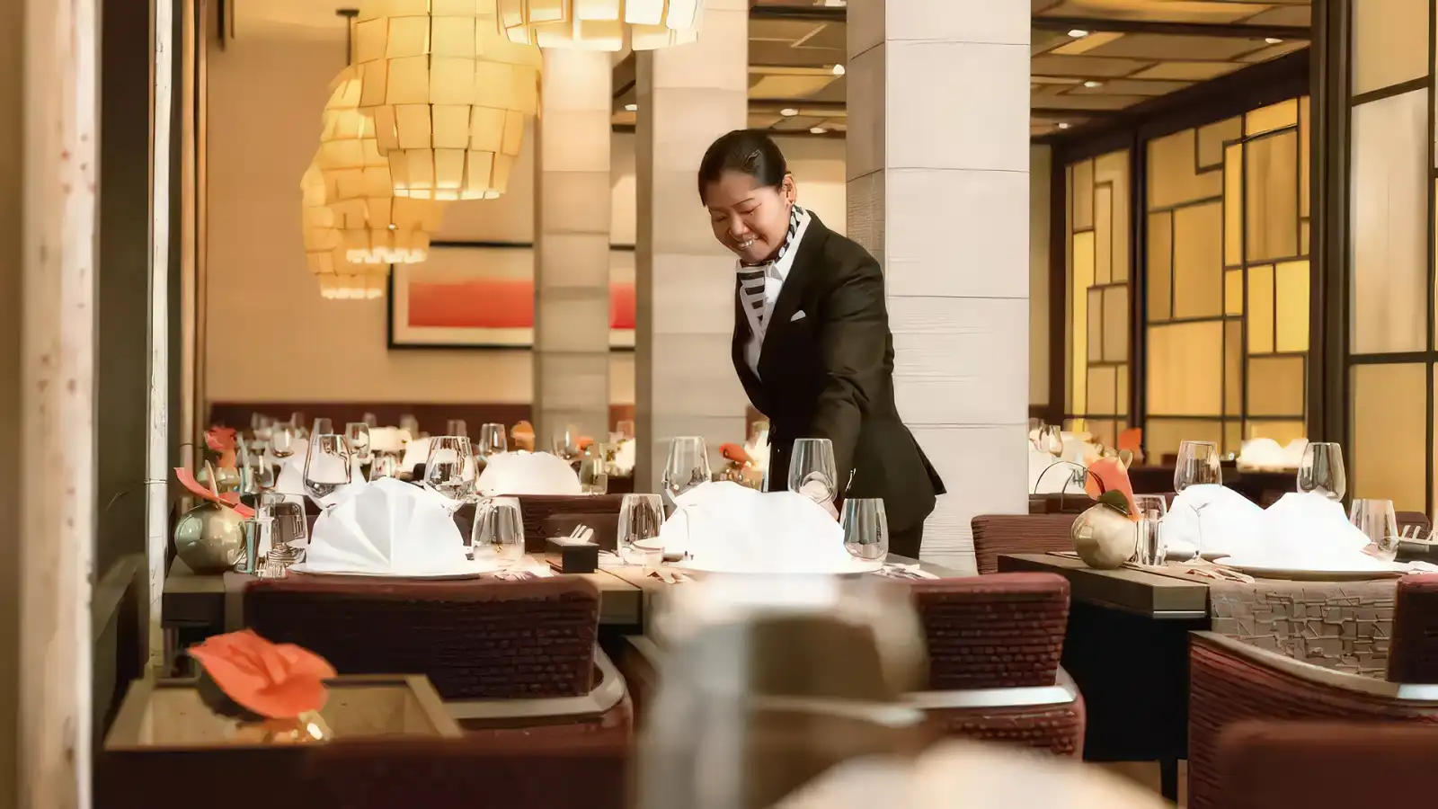 An elegant onboard restaurant on a Hapag-Lloyd expedition ship