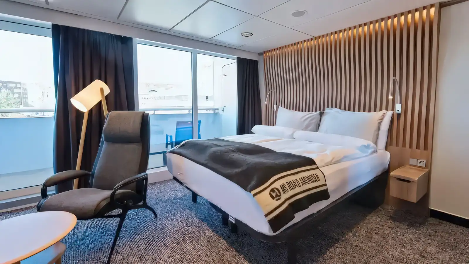 A comfortable cabin with polar views on a Hurtigruten expedition ship