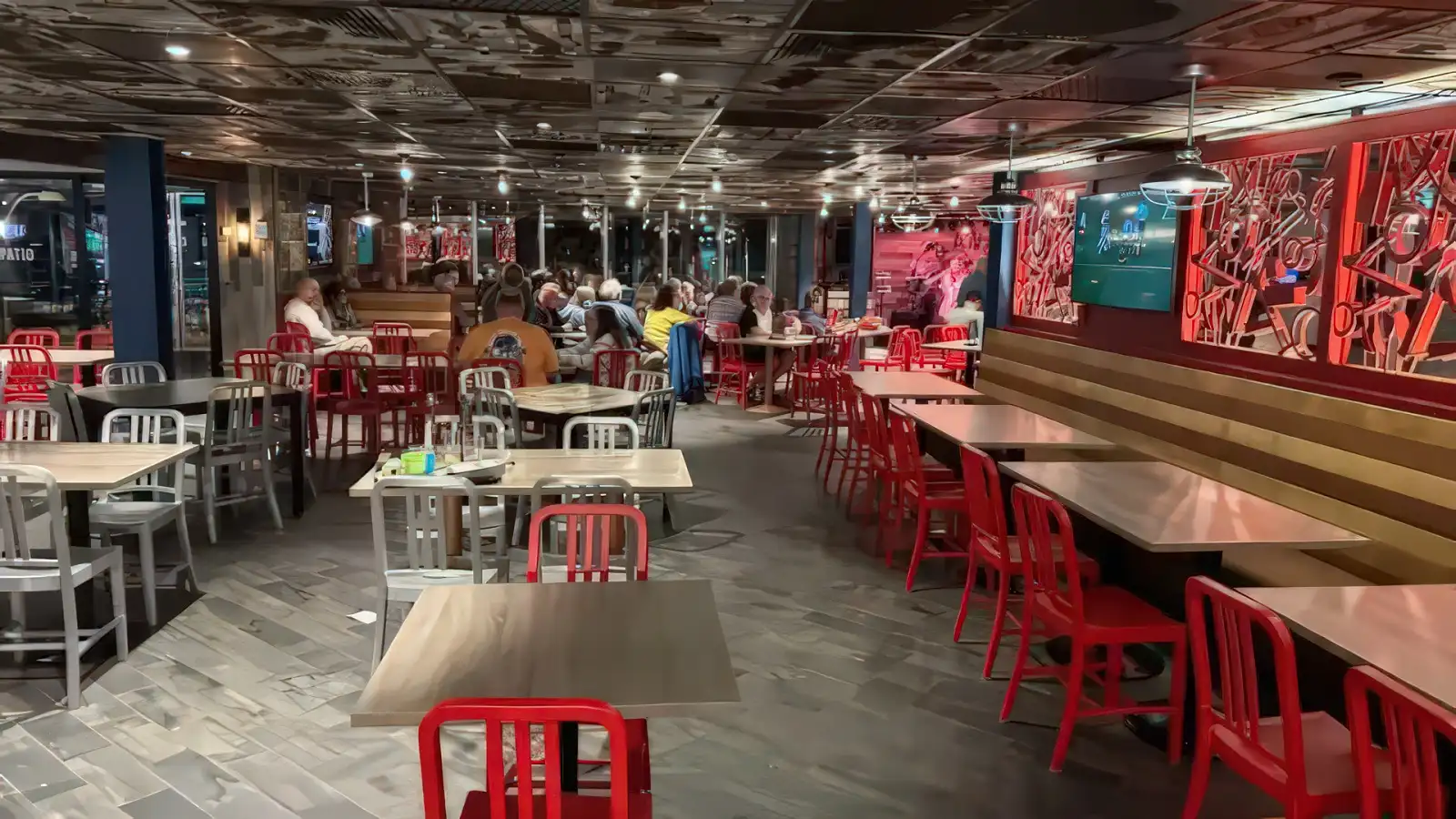 Guests dining in a Carnival main restaurant