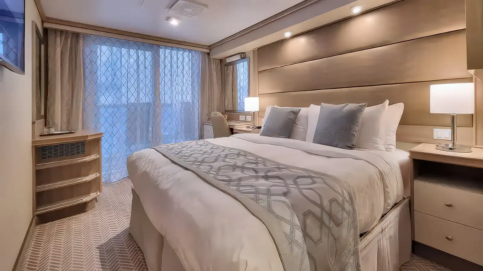A Princess balcony stateroom with the bed facing the window