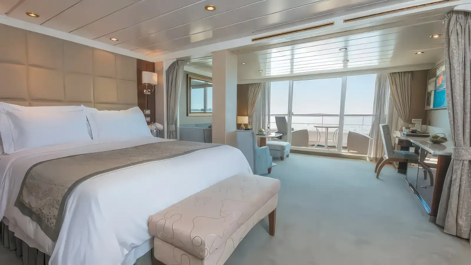 A Regent Seven Seas suite with sitting area and veranda