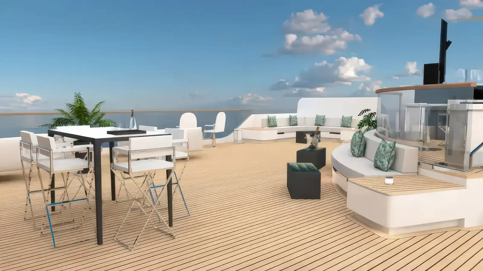 Guests relaxing on the open deck of a Ritz-Carlton yacht at sunset