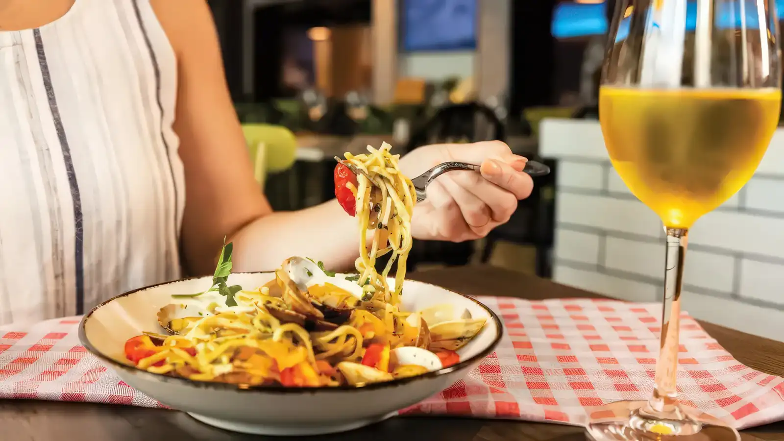 A plated pasta dish at a Royal Caribbean specialty restaurant