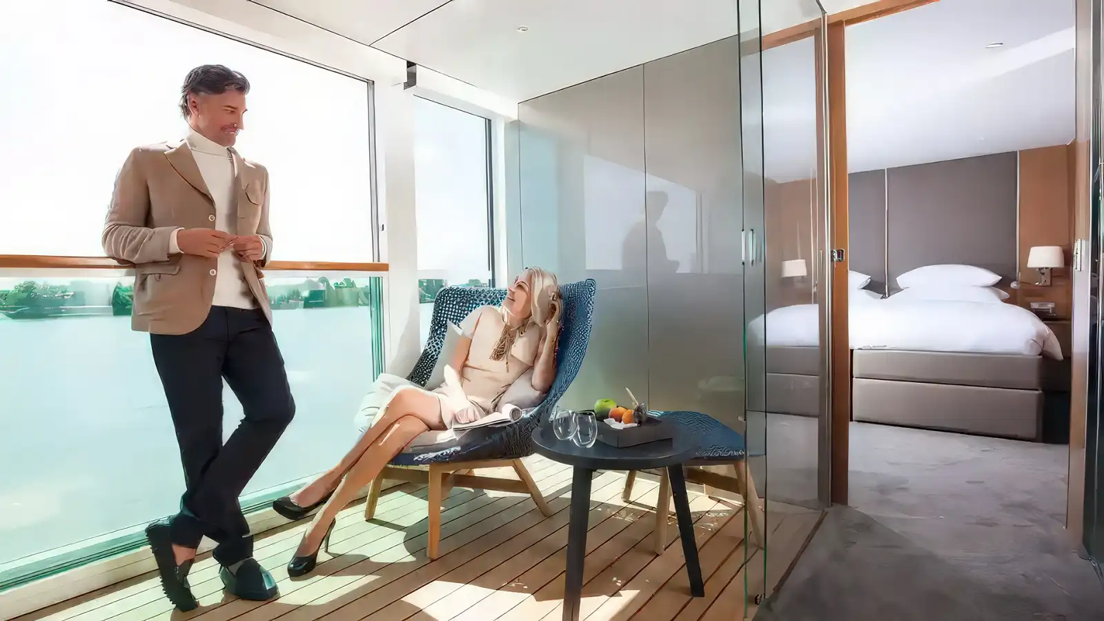 A Scenic suite with the Sun Lounge glass wall lowered to open onto the river