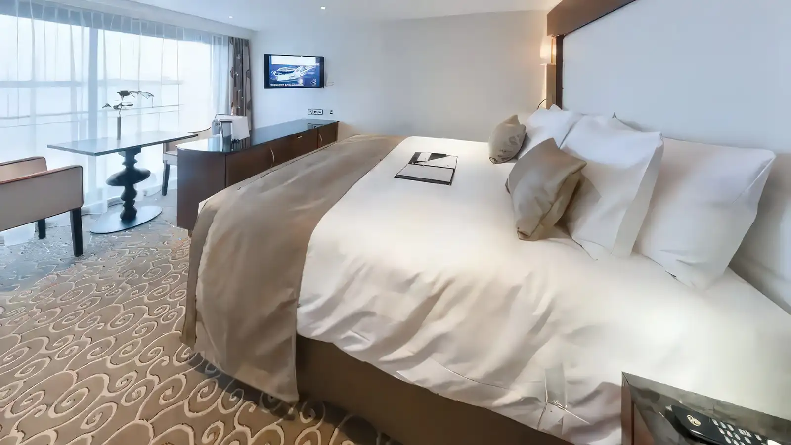 A spacious riverview cabin aboard a Tauck riverboat