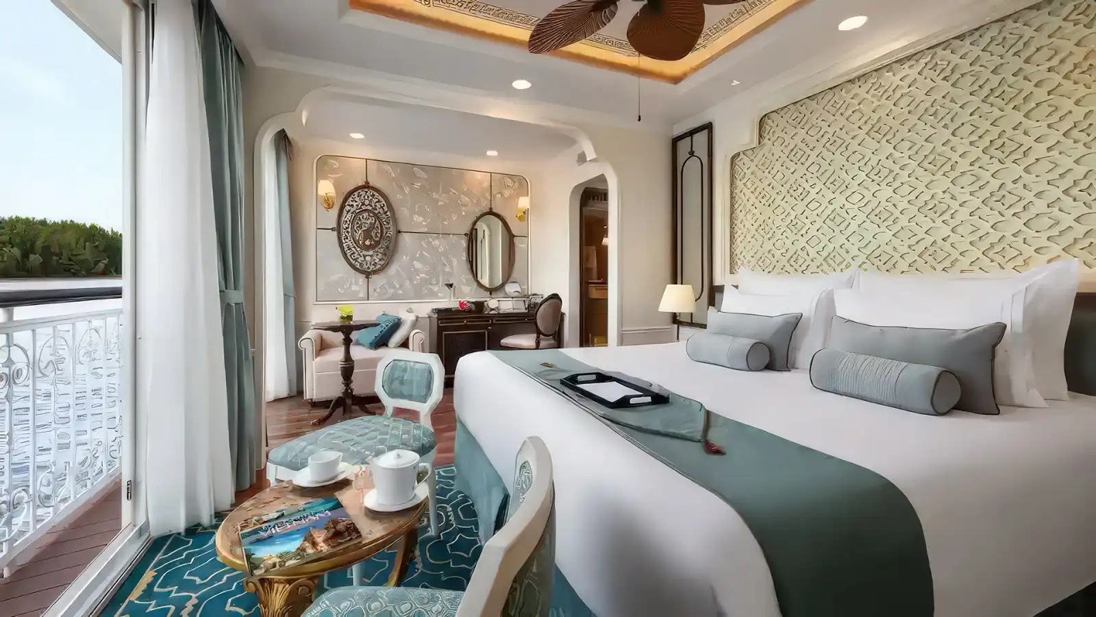 A richly decorated suite aboard a Uniworld Super Ship