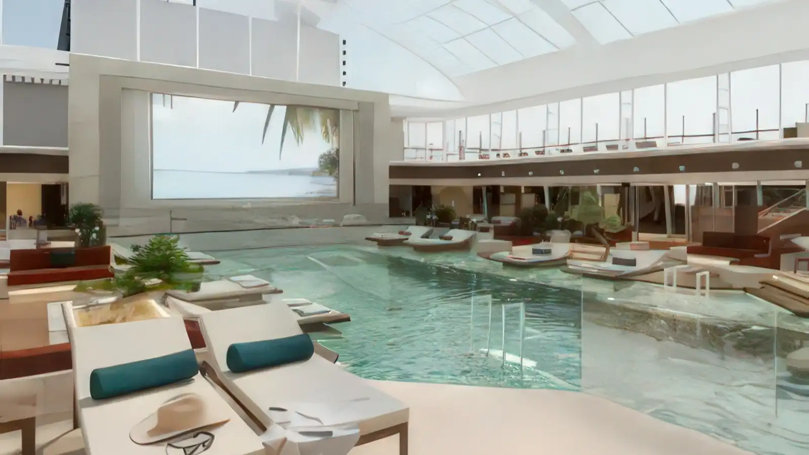A sheltered indoor pool and lounge area aboard an Explora ship