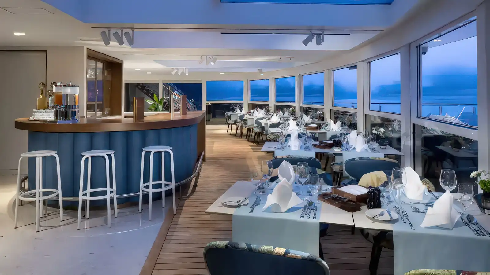 A plated multi-course dinner service in an AmaWaterways dining room
