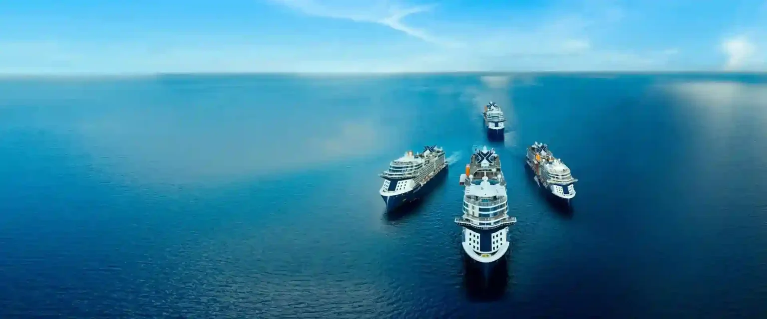 Guests gathered on the deck of a cruise ship at sea