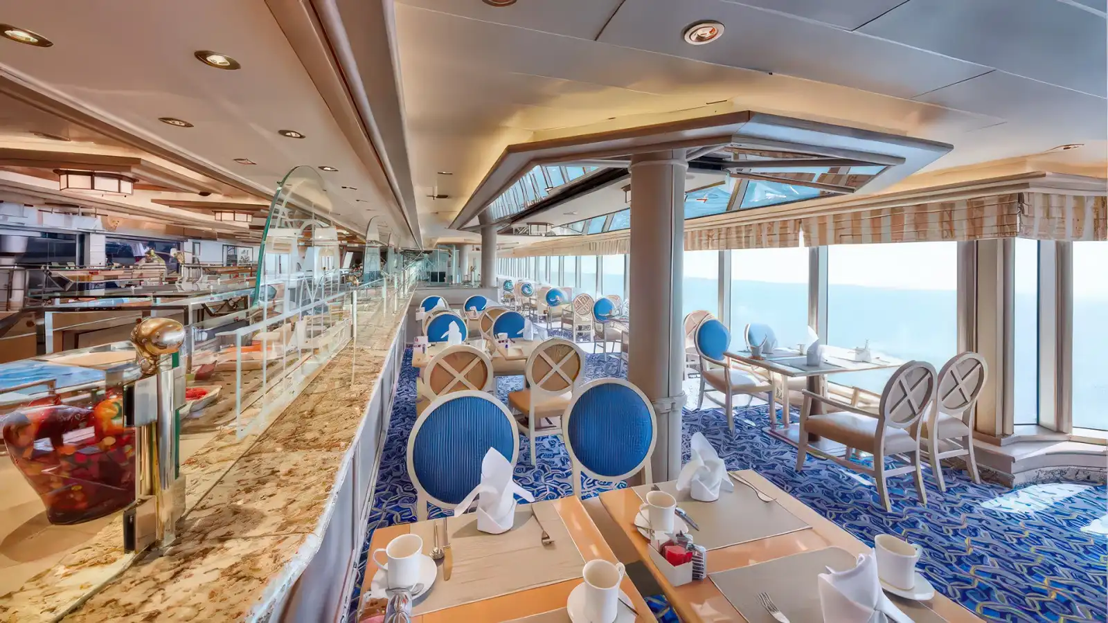 A bright Cunard buffet restaurant with sea views