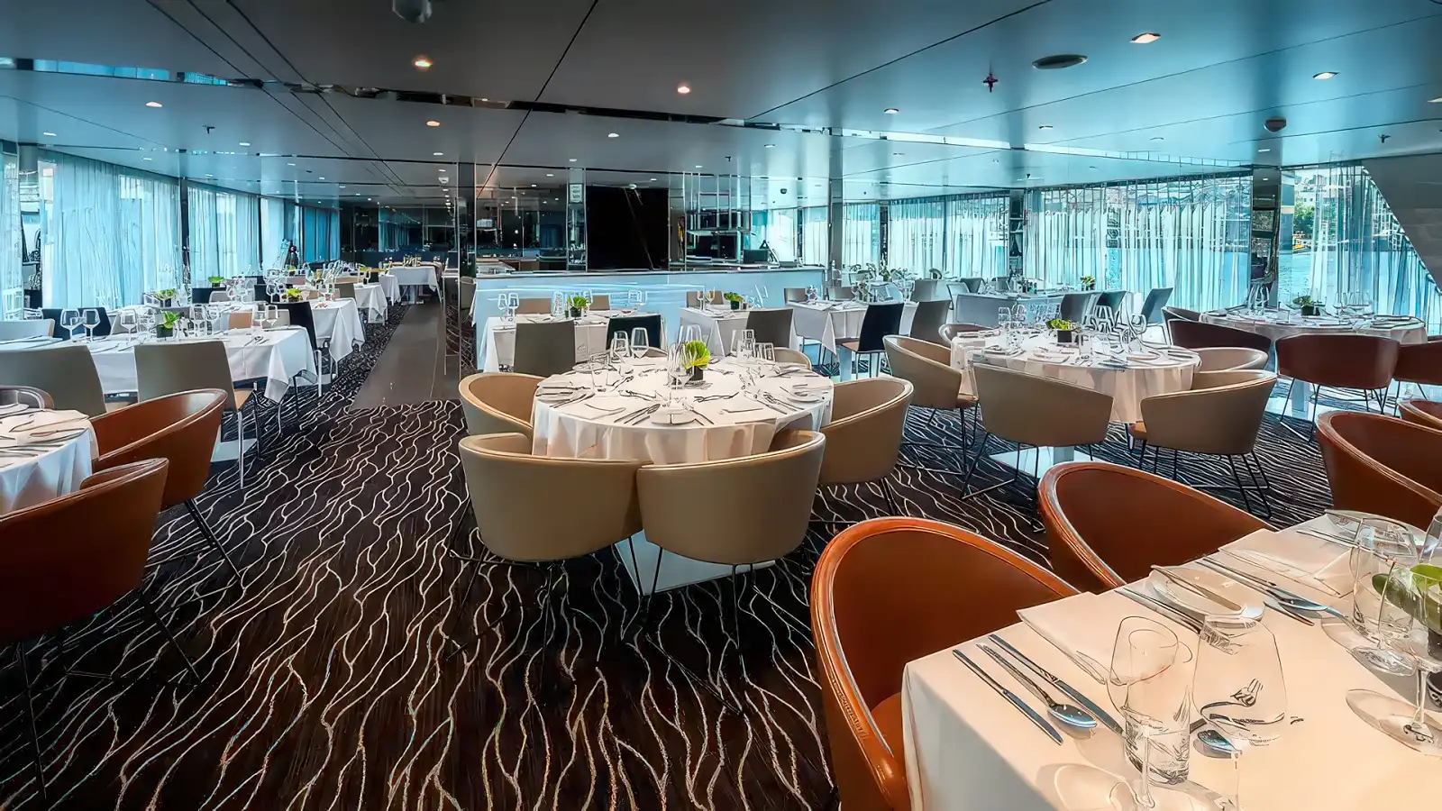 A dinner service in the main restaurant of an Emerald Cruises ship